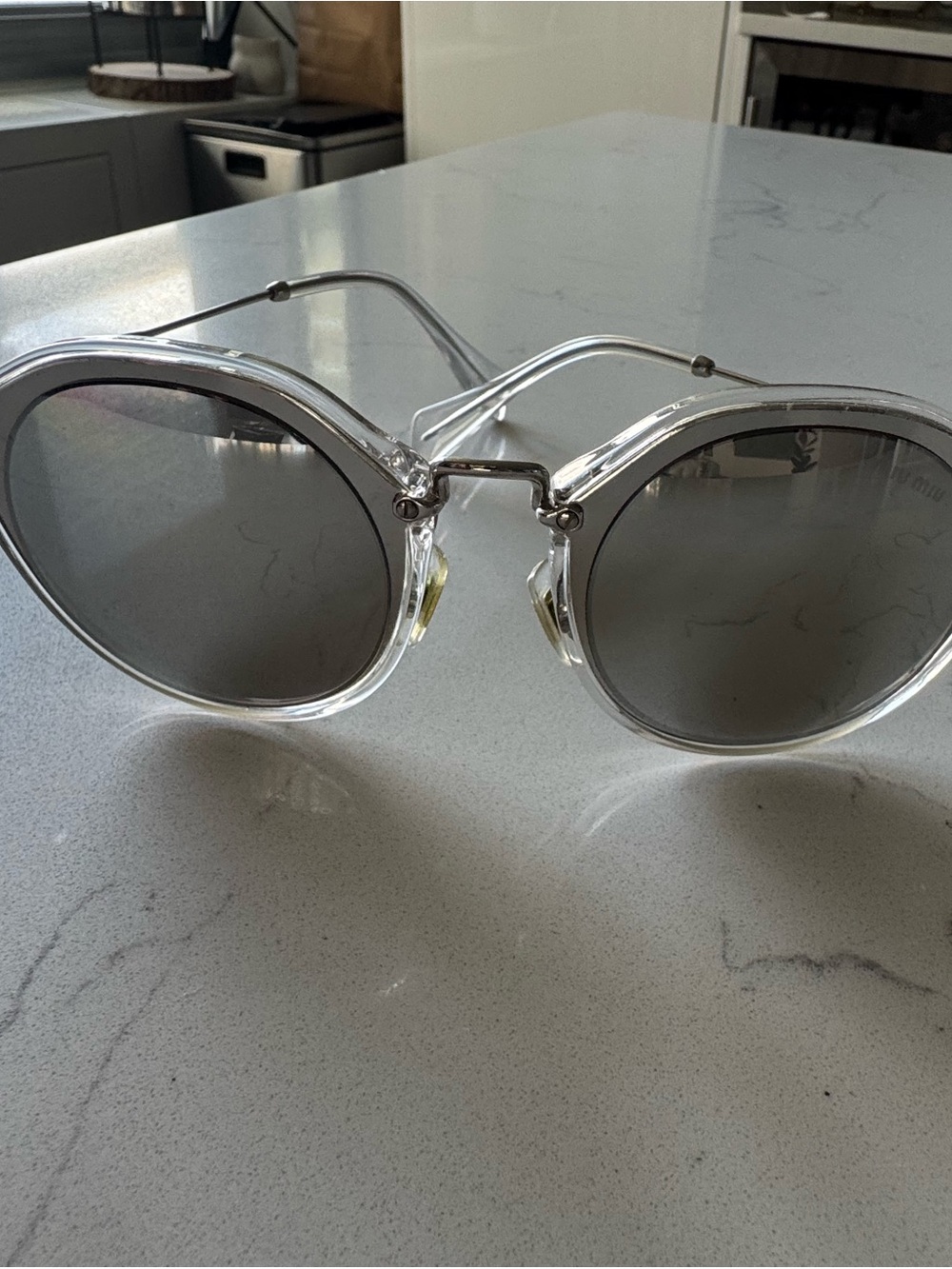 Miu Miu Clear Frame Round Sunglasses with Gray Lenses